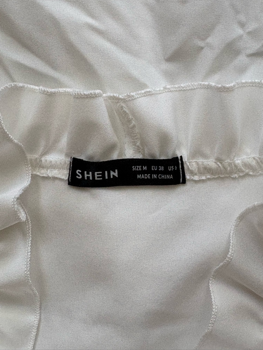 Women’s White Ruffle V-Neck Blouse - Picture 4 of 4